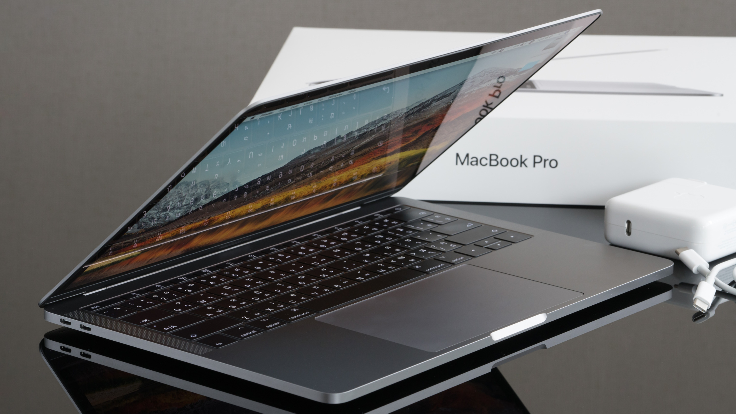 We won’t see an Apple MacBook Pro with an OLED screen for a few more years